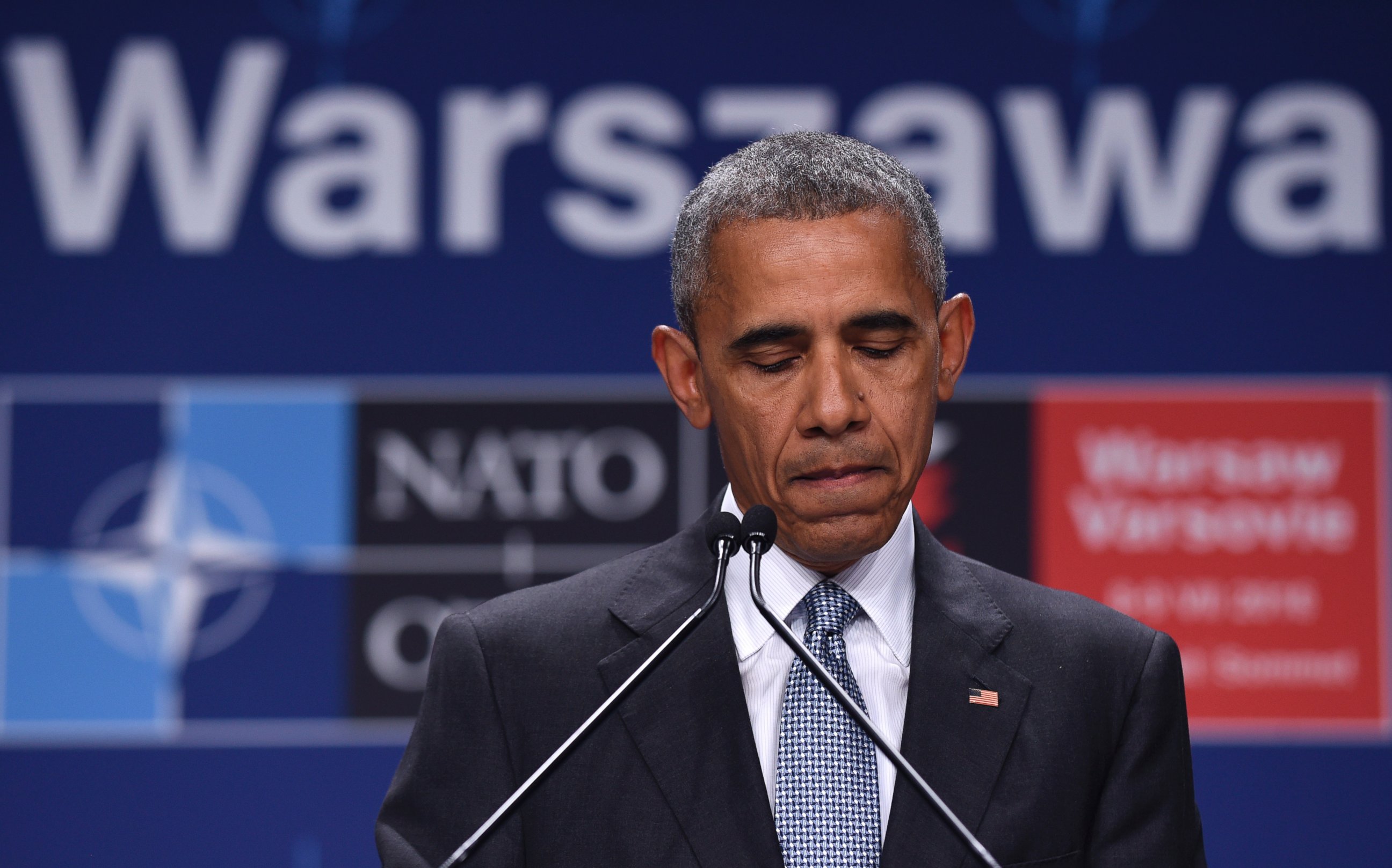 PHOTO: President Barack Obama pauses while speaking about the events in Dallas at the beginning of his news conference at PGE National Stadium in Warsaw, Poland, July 9, 2016.