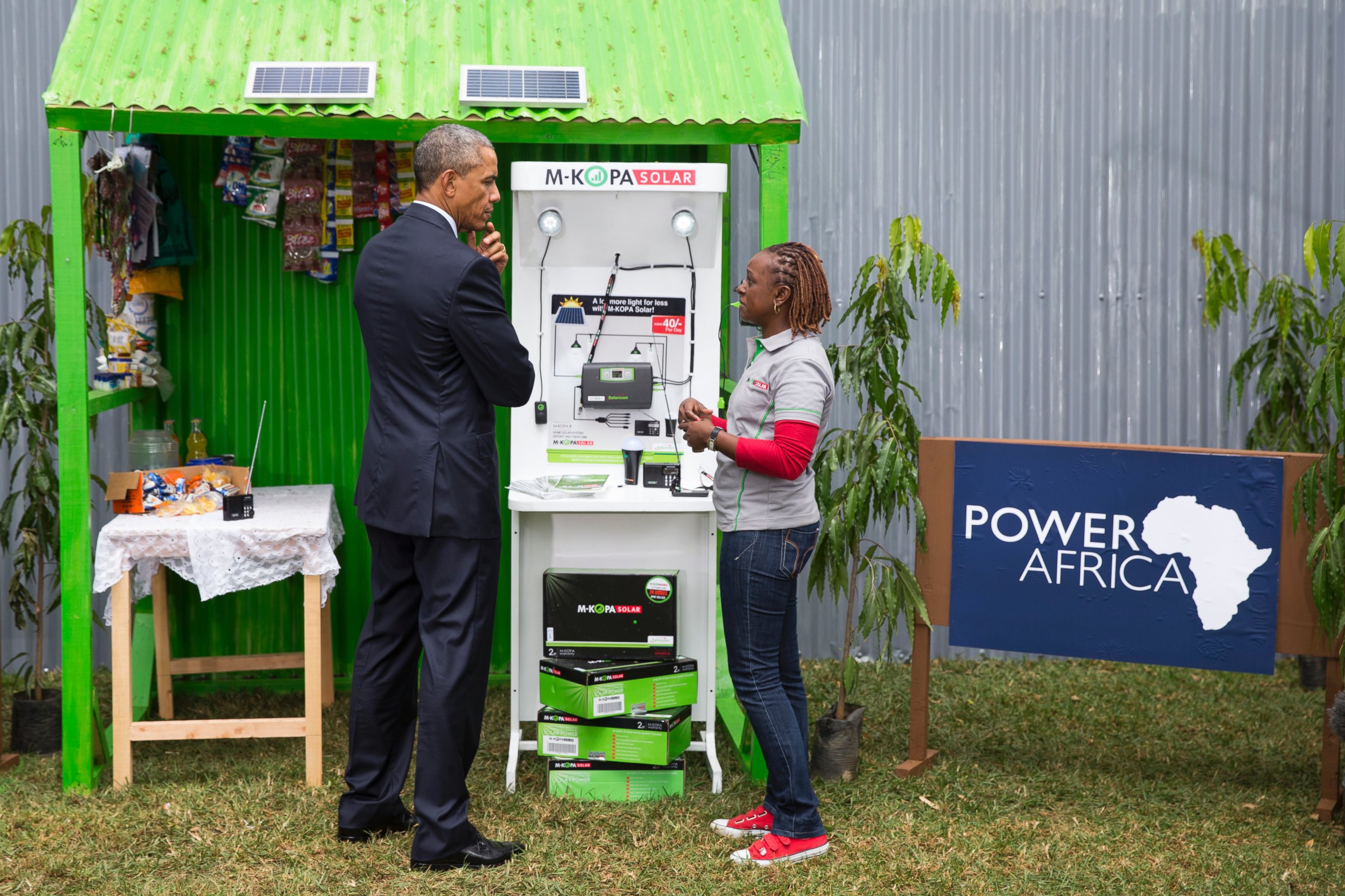 PHOTO: President Barack Obama looks at a solar power exhibit during a tour of the Power Africa Innovation Fair, Saturday, July 25, 2015, in Nairobi.