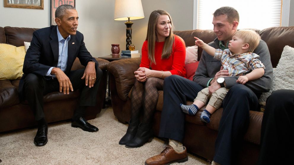 President Barack Obama visits with Lisa Martin, who wrote the president, her husband Jeff Martin and their son Cooper in their living room, in Omaha, Neb., Jan. 13, 2016.  After giving his State of the Union address, he is in Omaha, Neb., to tout progress and goals in his final year in office.