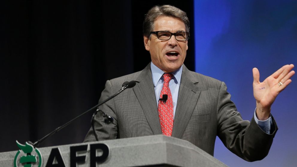 PHOTO: Texas Gov. Rick Perry speaks at the Americans for Prosperity gathering Aug. 29, 2014, in Dallas.
