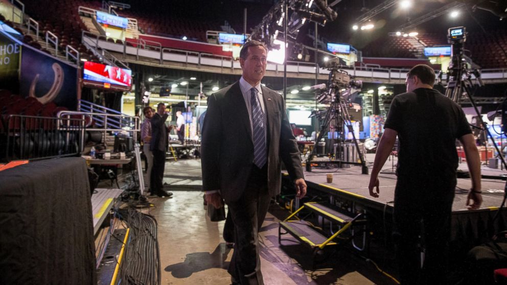 Republican presidential candidate, former Pennsylvania Sen. Rick Santorum walks into the the Quicken Loans Arena in Cleveland, Thursday, Aug. 6, 2015, before tonight's first Republican presidential debate. Santorum has not qualified for the primetime debate and will be participating in a pre-debate forum with six other non-qualifying candidates.