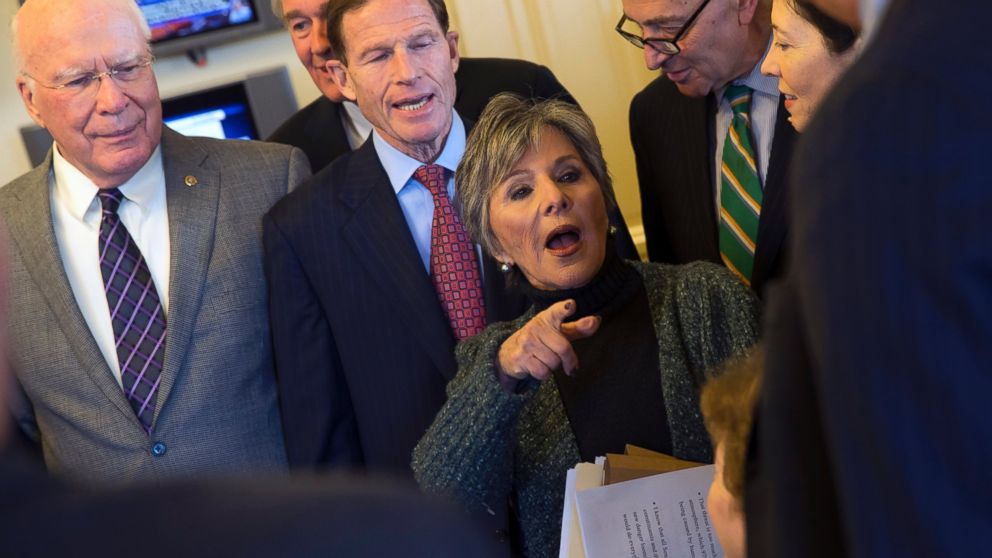 Senate Environment and Public Works Committee Chairman Sen. Barbara Boxer, D-Calif., talks with Senators during a meeting of the Senate Climate Action Task Force prior to taking to the Senate Floor all night to urge action on climate change, March 10, 2014, in Washington.