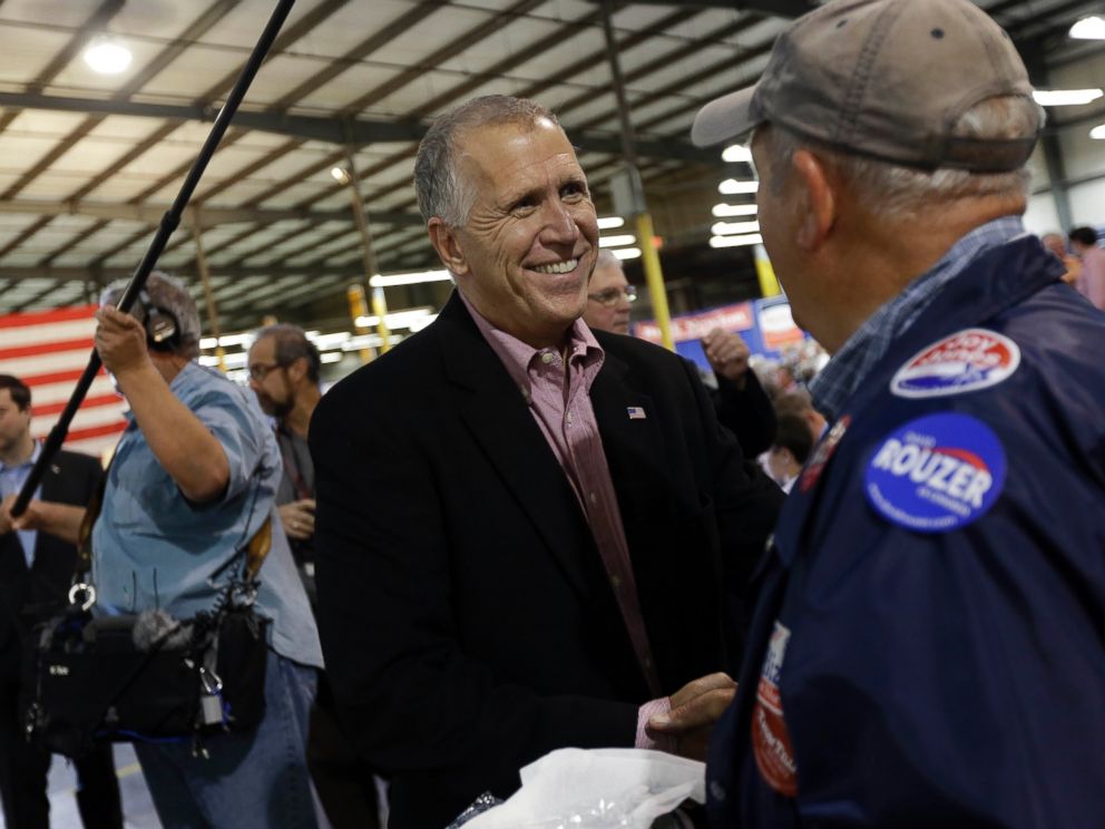 PHOTO: U.S. Senate candidate and Speaker of the N.C. House Thom Tillis speaks with a supporter during a conservative rally in Smithfield, N.C., Friday, Oct. 24, 2014.