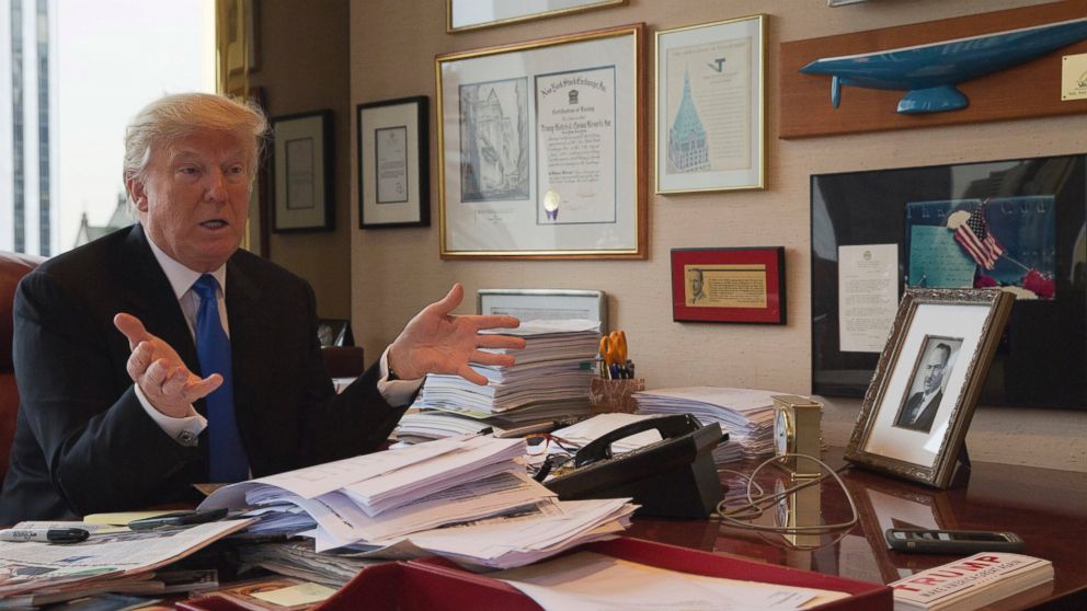 Republican presidential candidate Donald Trump gestures as he speaks during an interview with The Associated Press at his office in Trump Tower, May 10, 2016, in New York. 