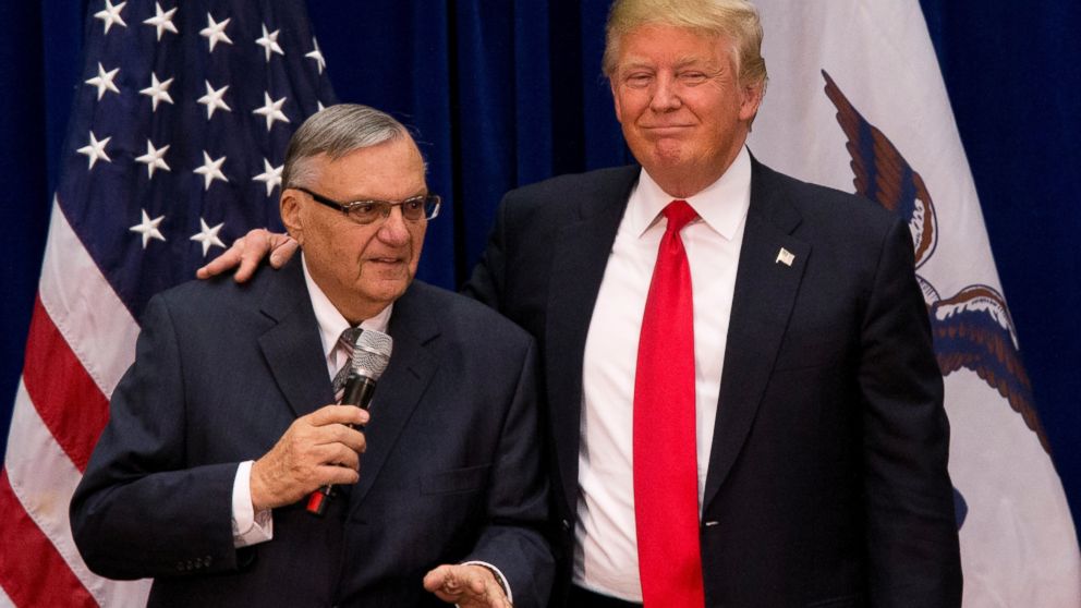 Donald Trump is joined by Maricopa County, Ariz., Sheriff Joe Arpaio at a campaign event at the Roundhouse Gymnasium, Jan. 26, 2016, in Marshalltown, Iowa. 