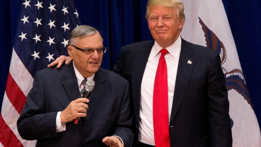 Donald Trump is joined by Maricopa County, Ariz., Sheriff Joe Arpaio at a campaign event at the Roundhouse Gymnasium, Jan. 26, 2016, in Marshalltown, Iowa.