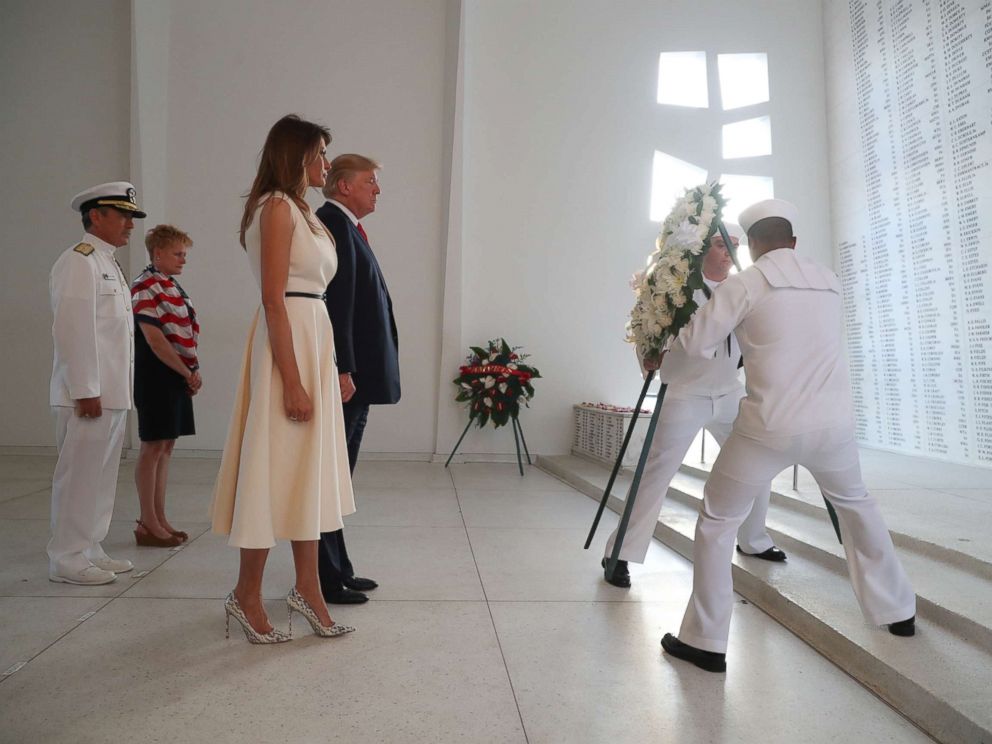 PHOTO: U.S. President Donald Trump and first lady Melania Trump lay a wreath at the USS Arizona Memorial in Pearl Harbor, Honolulu, Hawaii, Friday, Nov. 3, 2017.