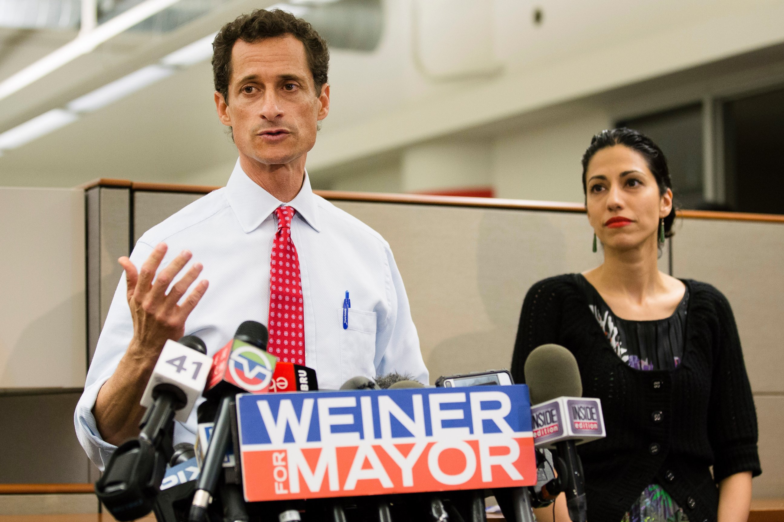 PHOTO: Then-New York mayoral candidate Anthony Weiner speaks during a news conference alongside his wife Huma Abedin in New York, July 23, 2013. 