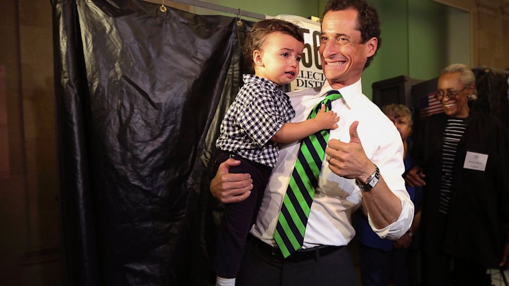 Democratic mayoral hopeful Anthony Weiner holds his son Jordan as he leaves the voting booth after casting his vote at his polling station during the primary election in New York, Sept. 10, 2013. 