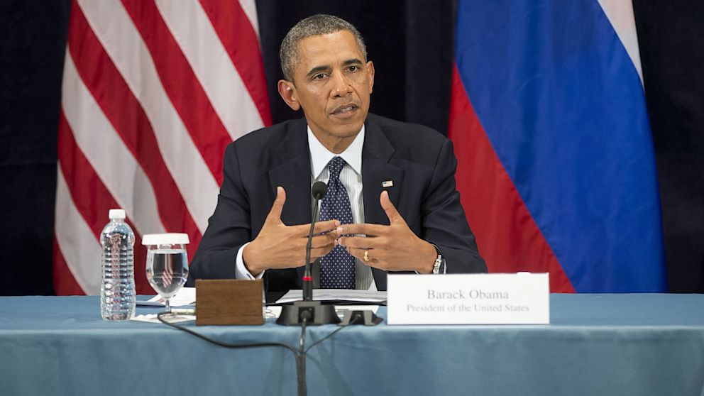 President Barack Obama gestures while speaking during a "Civil Society Roundtable" with gay, lesbian, bisexual and transgender activists, Sept. 6, 2013, in St. Petersburg, Russia.