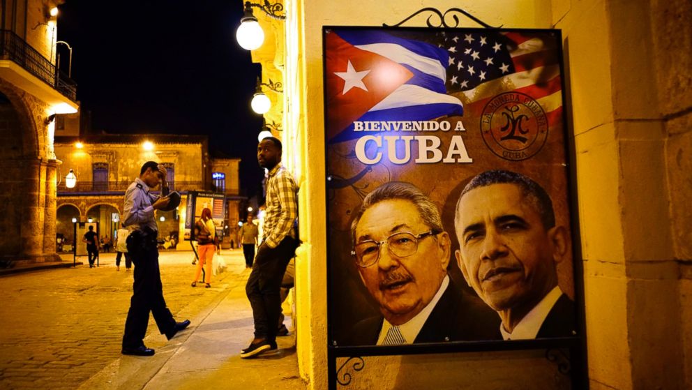 PHOTO: A poster features portraits of Cuba's President Raul Castro, left, and President Barack Obama and reads in Spanish "Welcome to Cuba" outside a restaurant in Havana, Cuba, March 17, 2016. 