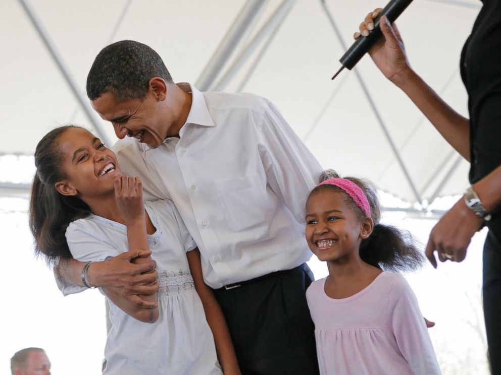 PHOTO: Then-Democratic presidential hopeful, Sen. Barack Obama, D-Ill., stands with his two daughters, Malia, left, and Sasha, as he is introduced by his wife Michelle, right, at Headwaters Park in Fort Wayne, Ind., May 4, 2008.