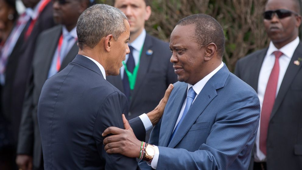 President Barack Obama is greeted by Kenya's President Uhuru Kenyatta, right, on his arrival at State House in Nairobi, Kenya, July 25, 2015.