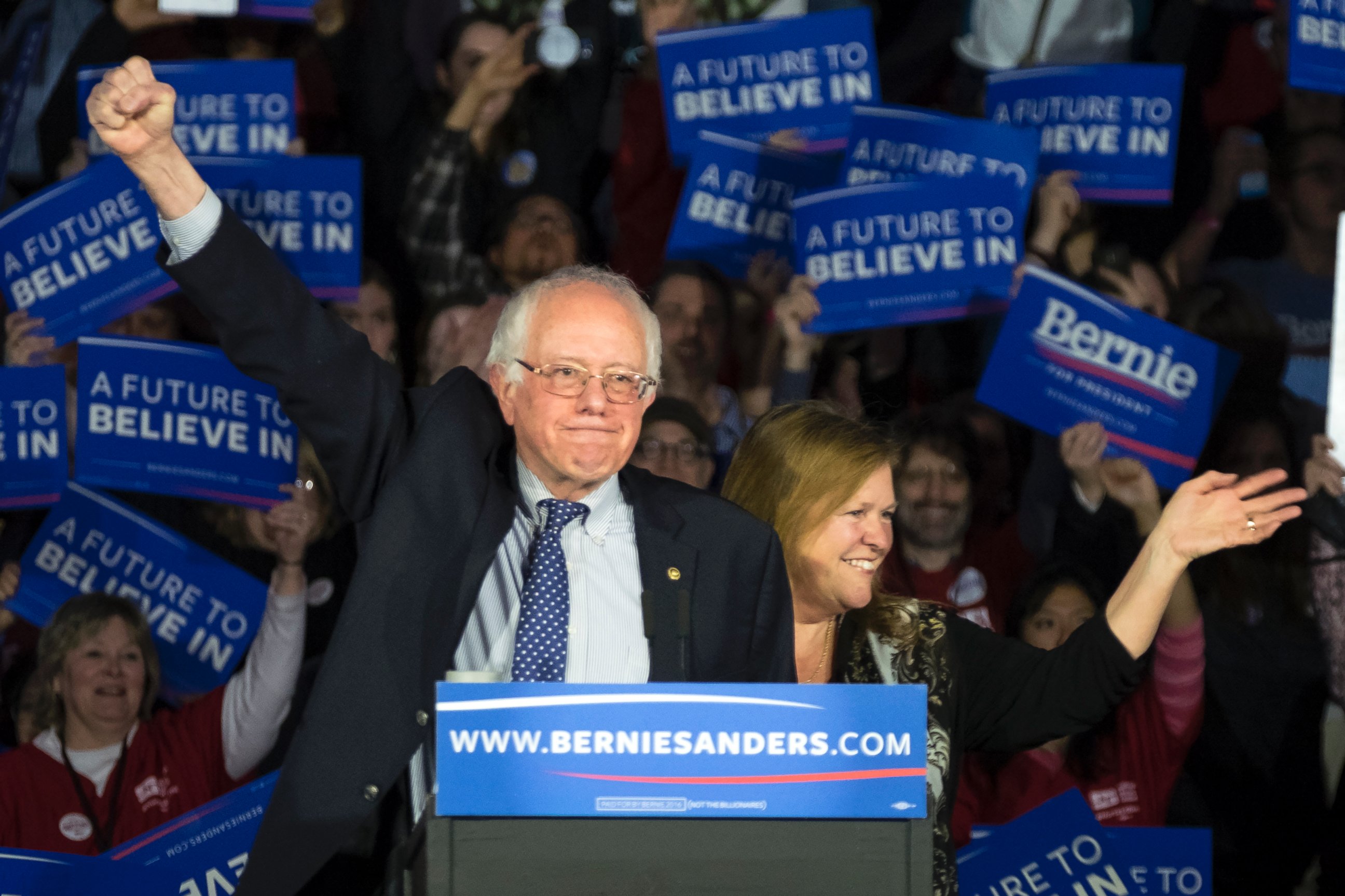 PHOTO: Democratic presidential candidate, Sen. Bernie Sanders, and his wife Jane acknowledge the crowd as he arrives for his caucus night rally in Des Moines, Iowa, Feb. 2, 2016. 