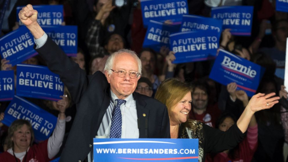 PHOTO: Democratic presidential candidate, Sen. Bernie Sanders, and his wife Jane acknowledge the crowd as he arrives for his caucus night rally in Des Moines, Iowa, Feb. 2, 2016. 