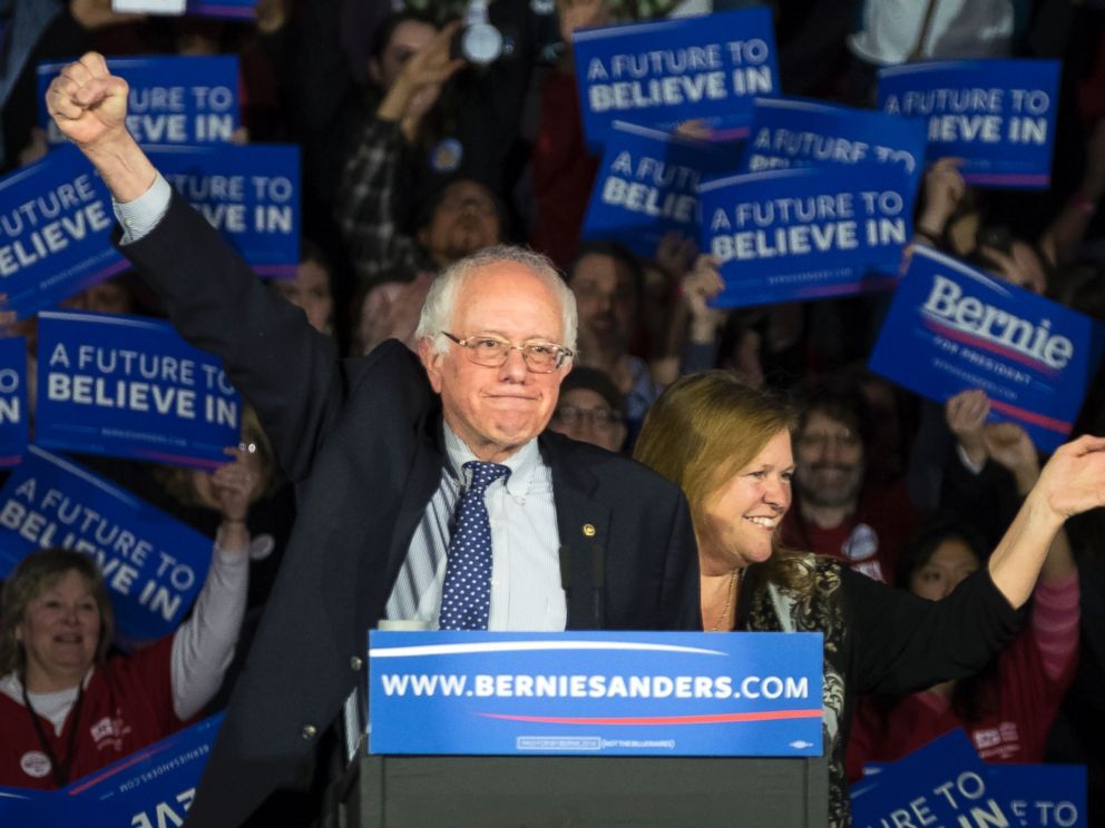 PHOTO: Democratic presidential candidate, Sen. Bernie Sanders, and his wife Jane acknowledge the crowd as he arrives for his caucus night rally in Des Moines, Iowa, Feb. 2, 2016.