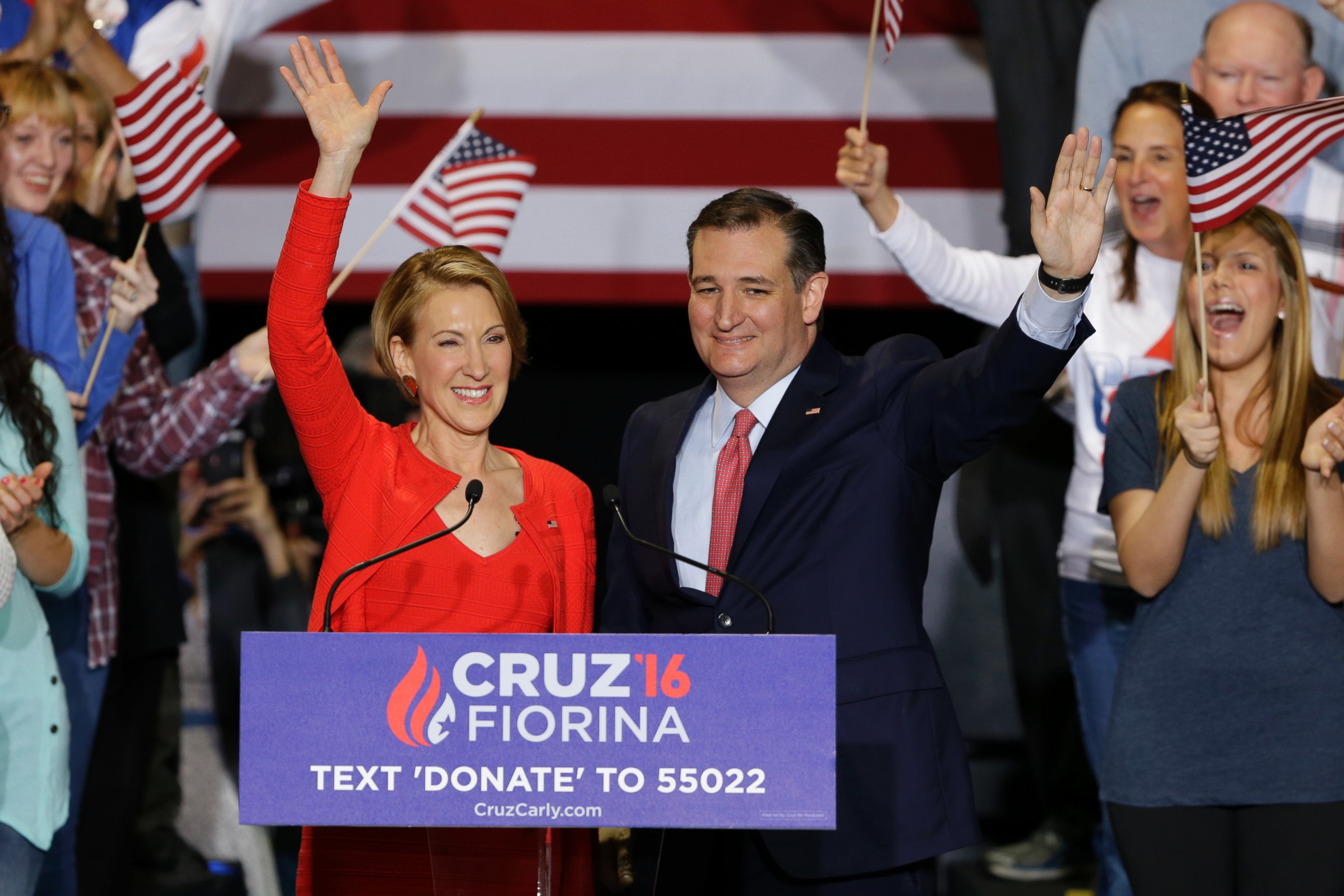Republican presidential candidate Sen. Ted Cruz, R-Texas, joined by former Hewlett-Packard CEO Carly Fiorina waves during a rally in Indianapolis, April 27, 2016, after Cruz announced he had tapped Fiorina to serve as his running mate. 