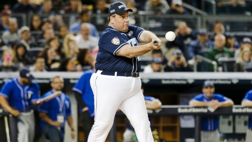 New Jersey Gov. Chris Christie bats during the first inning of the "True Blue" benefit celebrity softball game at Yankee Stadium, June 3, 2015, in New York.