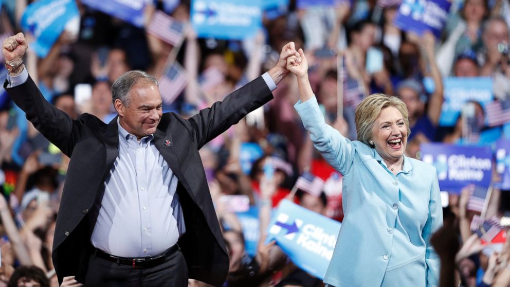 Democratic presidential candidate Hillary Clinton arrives with Sen. Tim Kaine, at a rally at Florida International University Panther Arena in Miami, July 23, 2016.