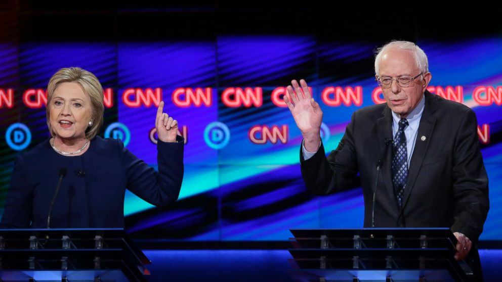 PHOTO: Democratic presidential candidate, Hillary Clinton argues a point as Sen. Bernie Sanders, reacts during a Democratic presidential primary debate at the University of Michigan-Flint, March 6, 2016, in Flint, Mich. 