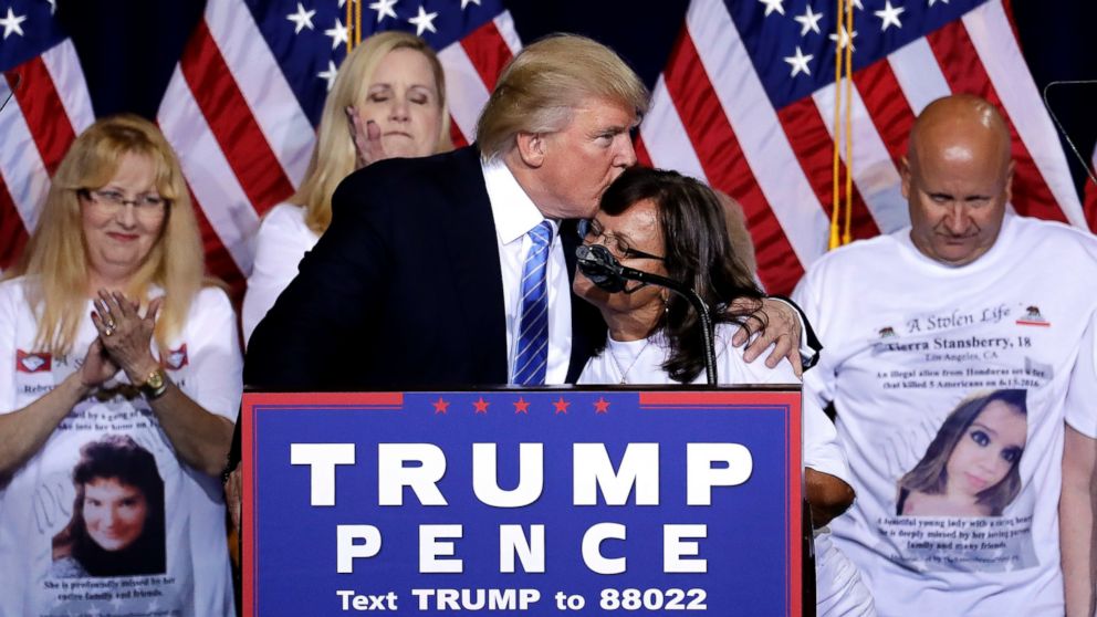 PHOTO: Republican presidential candidate Donald Trump hugs a woman, after delivering an immigration policy speech during a campaign rally at the Phoenix Convention Center, Aug. 31, 2016, in Phoenix. 