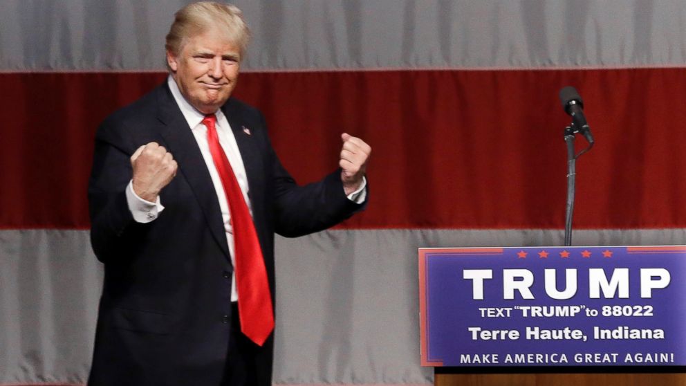 Republican presidential candidate Donald Trump reacts to a song during a campaign rally at the Indiana Theater in Terre Haute, Ind.
