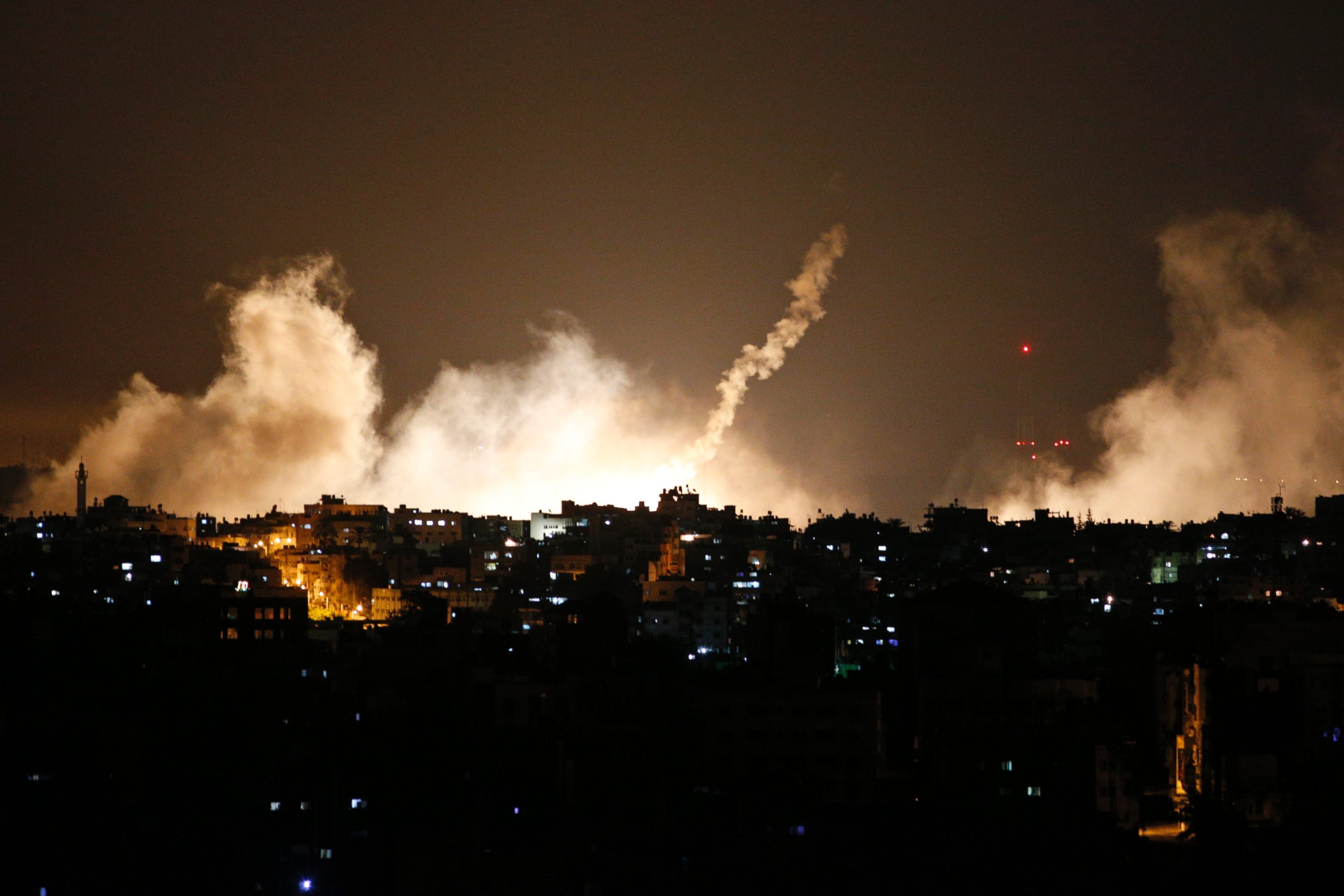 PHOTO: Smoke from flares rises in the sky in Gaza City, in the northern Gaza Strip,  July 17, 2014. 