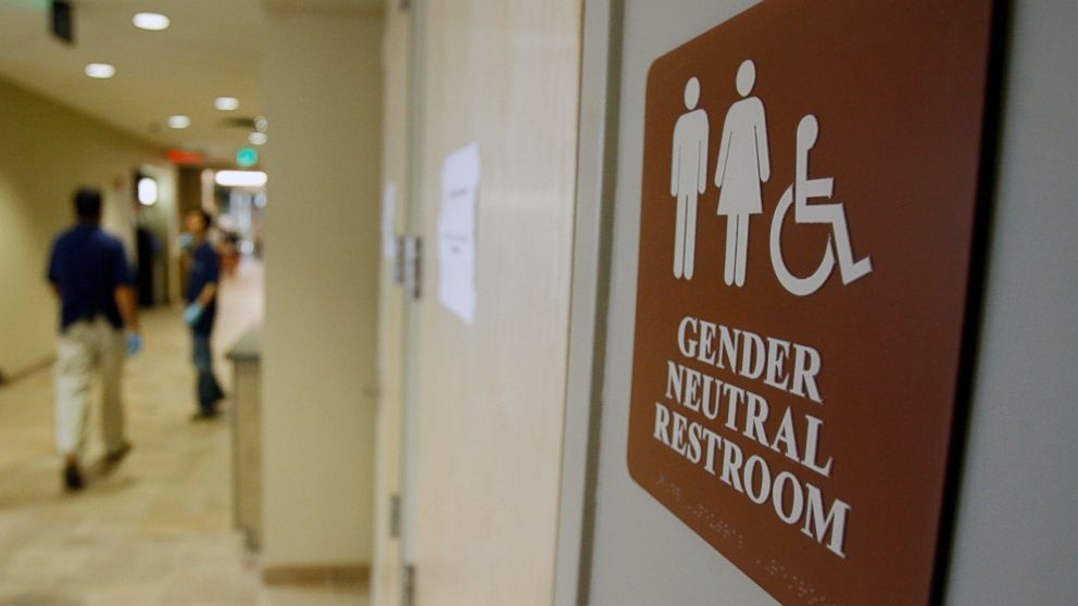 In this Aug. 23, 2007, file photo, a sign marks the entrance to a gender-neutral restroom at the University of Vermont in Burlington, Vt.