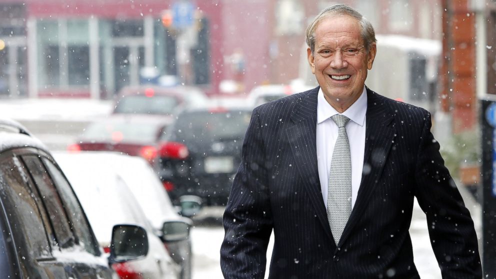 Former New York Republican Gov. George Pataki walks through the snow Monday, Jan. 12, 2015, in Concord, N.H. during a visit to the  nation'??s earliest presidential primary state.