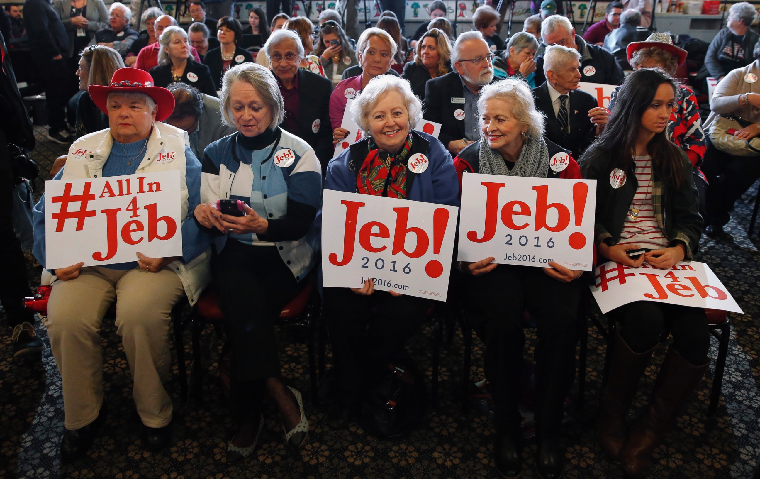 PHOTO: Supporters of Republican presidential candidate, former Florida Gov. Jed Bush, hold signs at a campaign stop at Wade's Restaurant in Spartanburg, S.C., Feb. 19, 2016. 