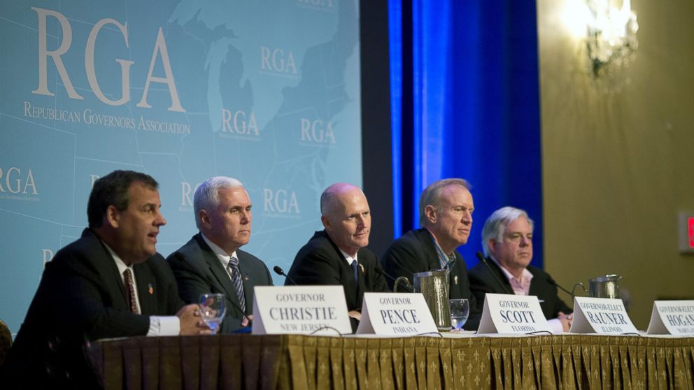 New Jersey Gov. Christ Christie, left, Indiana Gov. Mike Pence, Fla. Gov. Rick Scott, Illinois Gov-elect Bruce Rauner and Maryland Gov.-elect Larry Hogan talk about recent Republican party gains during a press conference at the Republican governors' conference in Boca Raton, Fla., Nov. 19, 2014.