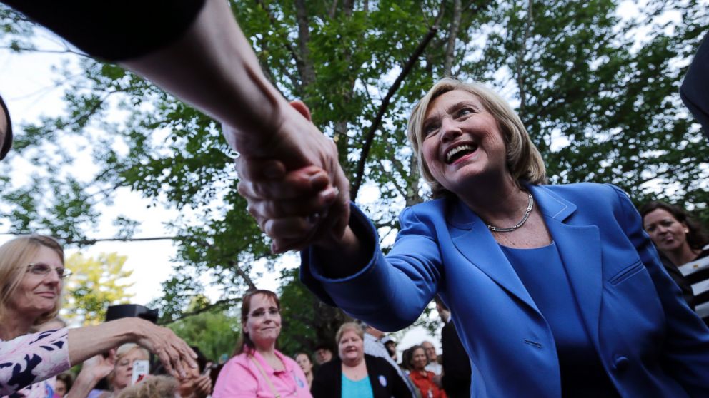 PHOTO: Democratic presidential candidate Hillary Rodham Clinton shakes hands with guests during a house party, July 16, 2015, in Windham, N.H.