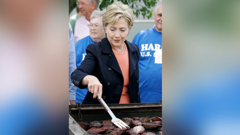 Democratic presidential hopeful Sen. Hillary Rodham Clinton, D-N.Y., flips steaks during Iowa Sen. Tom Harkin's annual fundraising steak fry, Sept. 16, 2007, in Indianola, Iowa.