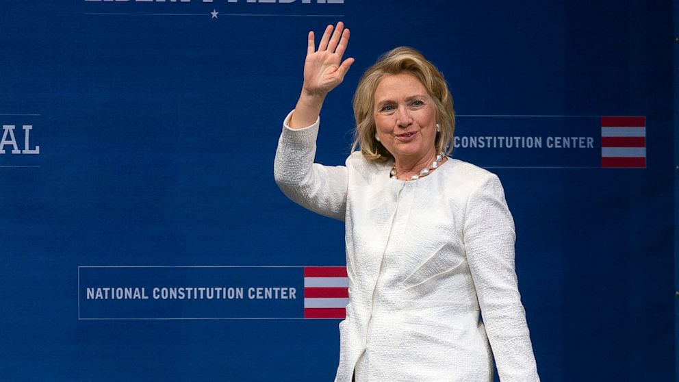 Former Secretary of State Hillary Rodham Clinton waves as she arrives to receive the Liberty Medal during a ceremony at the National Constitution Center, Tuesday, Sept. 10, 2013, in Philadelphia.