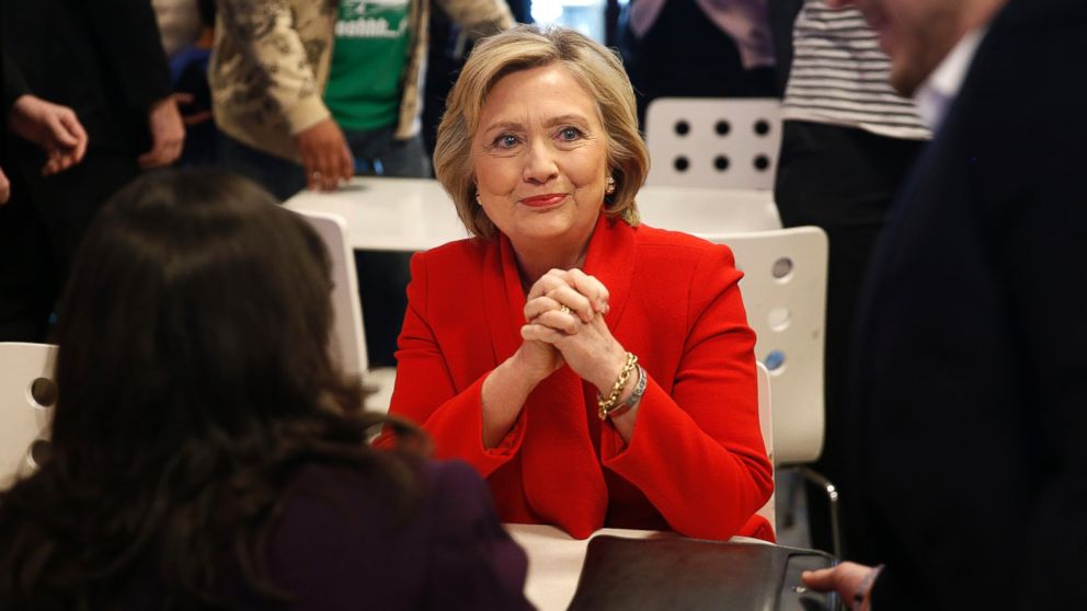 Democratic presidential candidate Hillary Clinton, center, visits Lee's Sandwiches during a campaign stop, Feb. 14, 2016, in Las Vegas. 