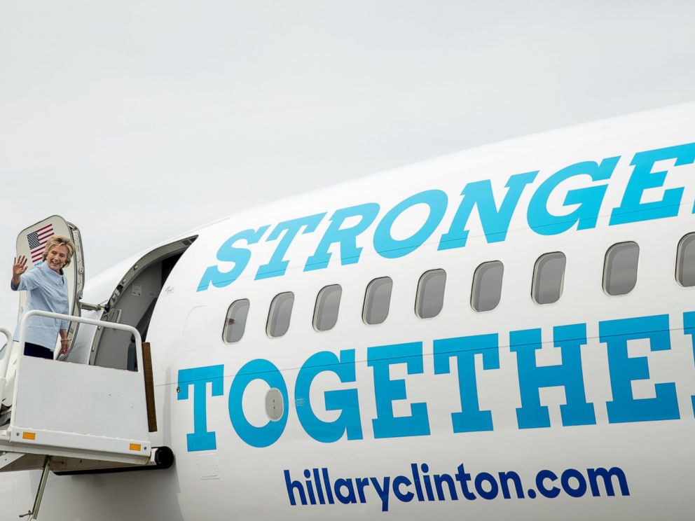 PHOTO: Democratic presidential candidate Hillary Clinton waves as she boards a new campaign plane at the Westchester County Airport in White Plains, New York, Sept. 5, 2016.