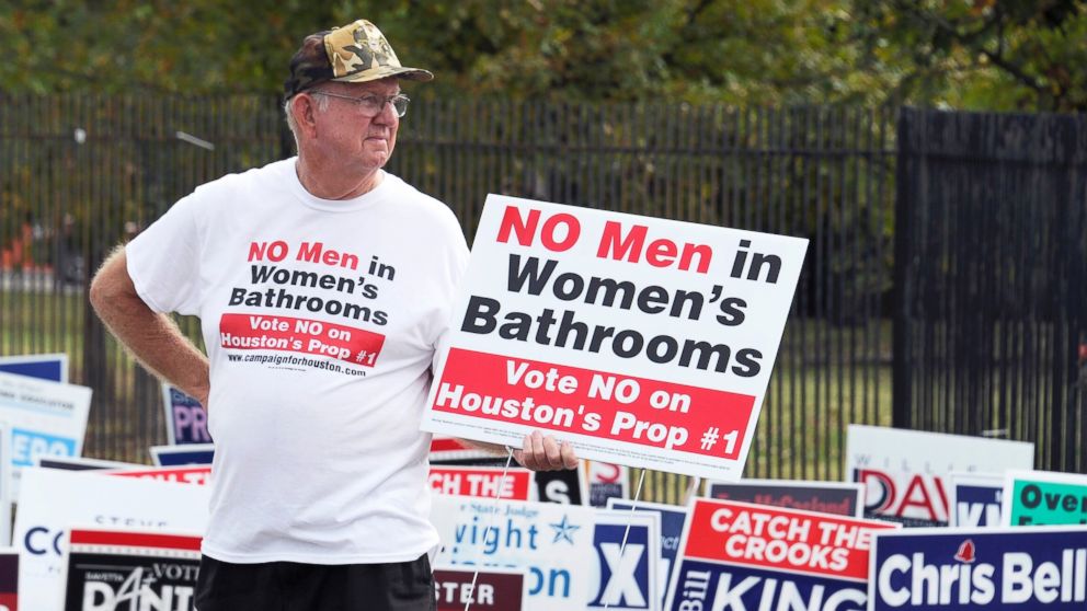 PHOTO: A man urges people to vote against the Houston Equal Rights Ordinance outside an early voting center in Houston, Oct. 21, 2015.