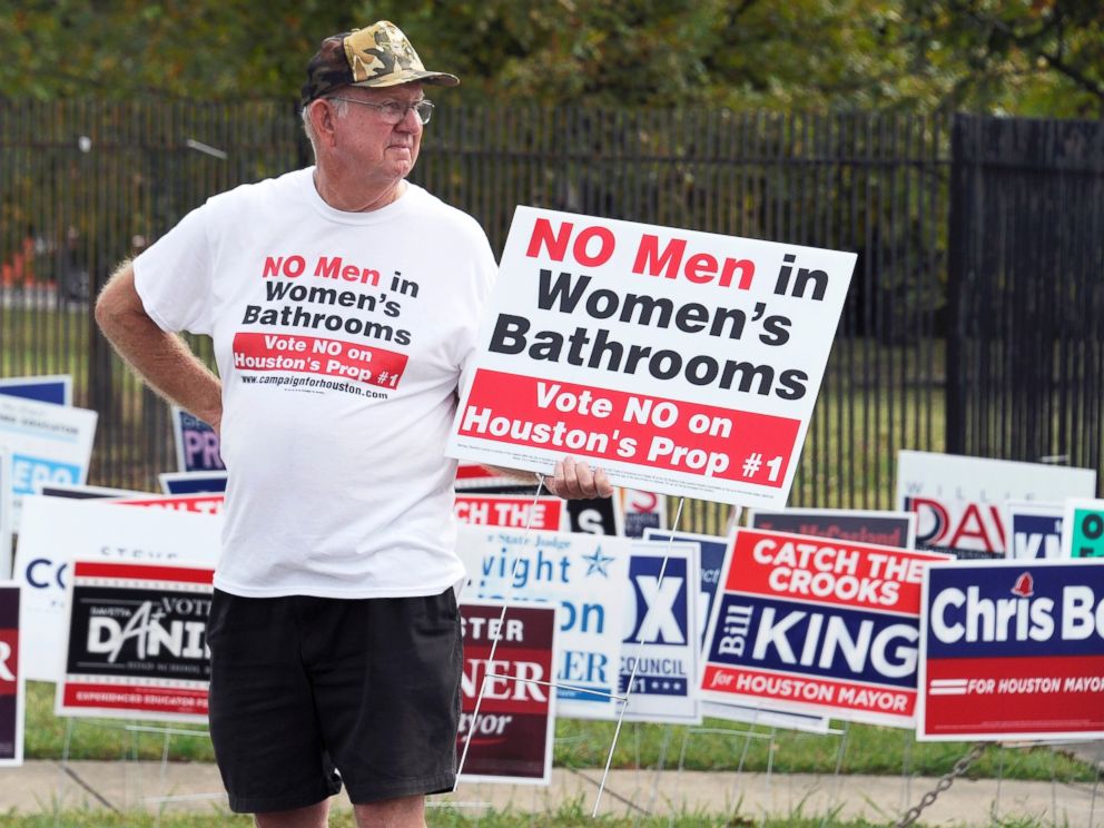 PHOTO: A man urges people to vote against the Houston Equal Rights Ordinance outside an early voting center in Houston, Oct. 21, 2015.