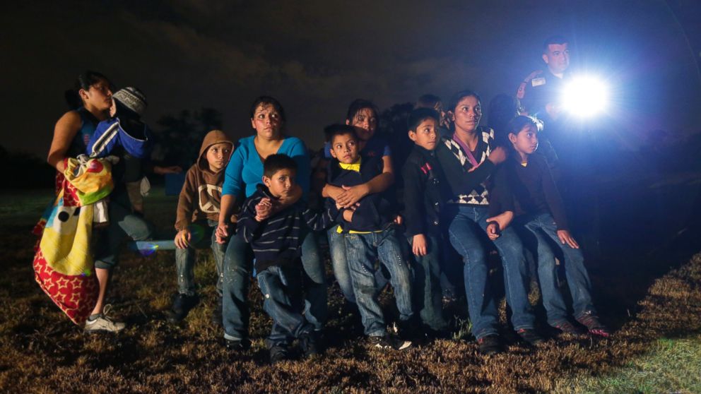PHOTO: This June 25, 2014, file photo shows a group of immigrants from Honduras and El Salvador who crossed the U.S.-Mexico border illegally as they are stopped in Granjeno, Texas.
