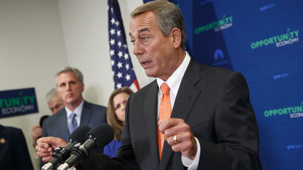 House Speaker John Boehner of Ohio says Senate Democrats should "get off their ass" and pass a bill to fund the Homeland Security Department and restrict President Barack Obama's executive moves on immigration, Feb. 11, 2015, during a news conference following a GOP strategy meeting, on Capitol Hill in Washington.