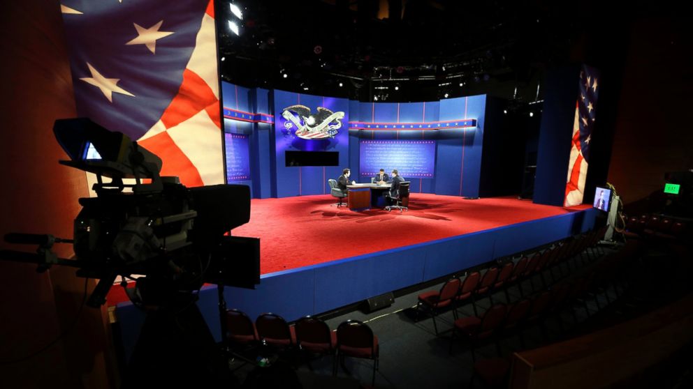 Lynn University students serve as stand-ins on the stage during final preparations for Monday's presidential debate between President Barack Obama and Republican presidential candidate, former Massachusetts Gov. Mitt Romney, Oct. 21, 2012, at Lynn University in Boca Raton, Fla. 