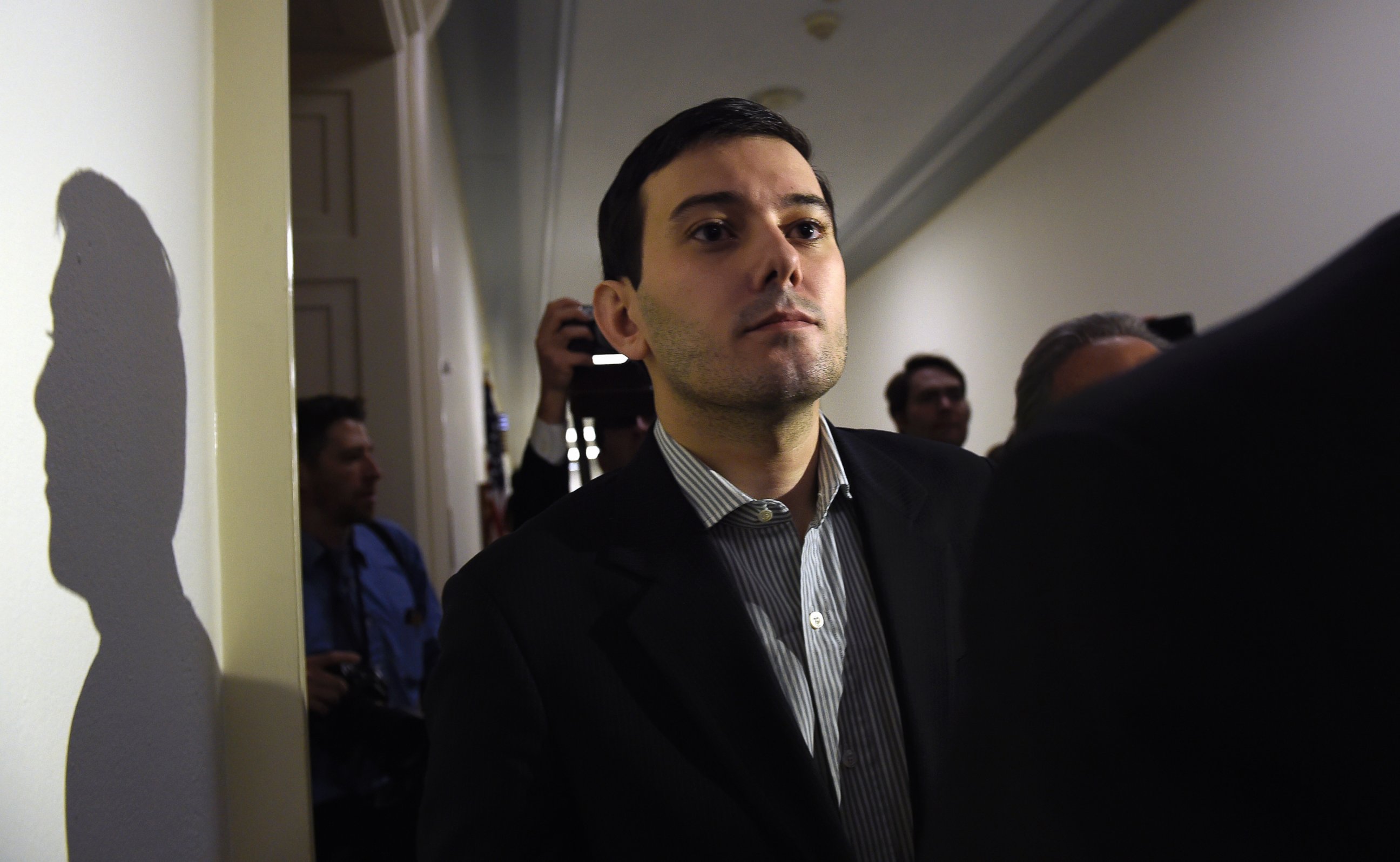PHOTO: Pharmaceutical chief Martin Shkreli is followed by reporters on Capitol Hill in Washington, Feb. 4, 2016, following his appearance before the House Committee on Oversight and Reform Committee. 