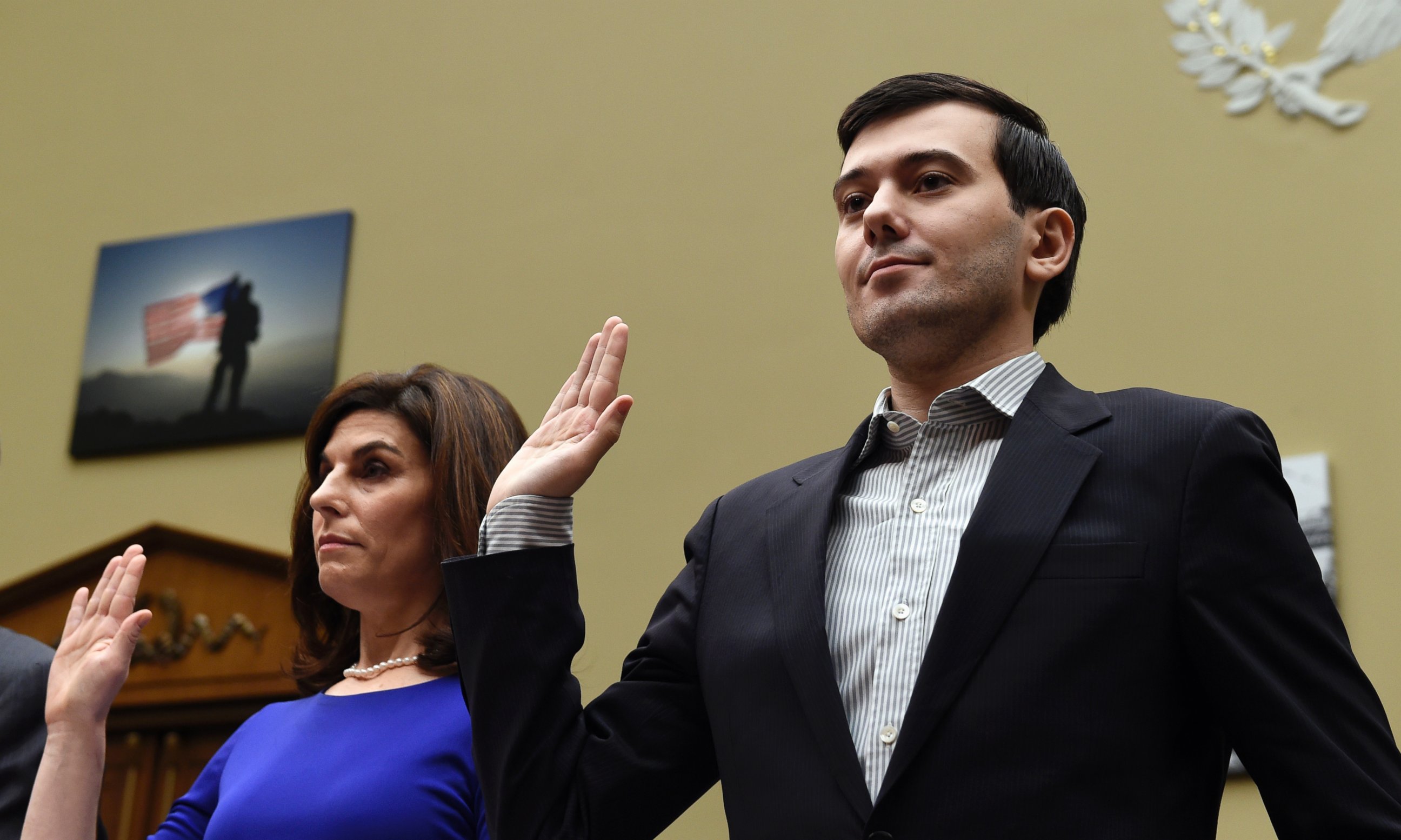 PHOTO: Pharmaceutical chief Martin Shkreli, right, and Nancy Retzlaff, Chief Commercial Officer of Turing Pharmaceuticals, are sworn in on Capitol Hill in Washington on Feb. 4, 2016.