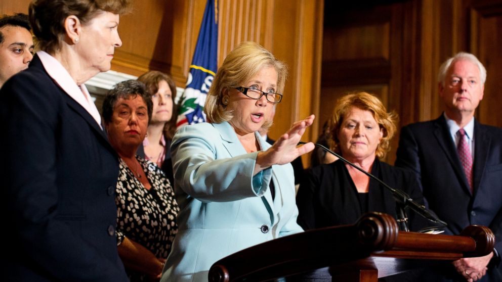 Sen. Mary Landrieu, D-La., center, with Sen. Jeanne Shaheen, D-N.H., left, Sen. Heidi Heitkamp, D-N.D., right, and others, speaks at a news conference and Capitol Hill in Washington with small business owners about the impact the government shutdown is having on business, in this Oct. 3, 2013 file photo. 
