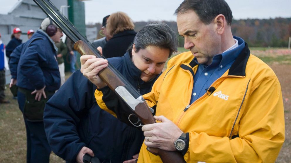 Presidential hopeful, former Arkansas Gov. Mike Huckabee, right, talks with Elizabeth Saunders as he prepares to shoot skeet during a campaign stop at the Spartanburg Gun Club in Pacolet, S.C., Sunday, Nov. 25, 2007. 