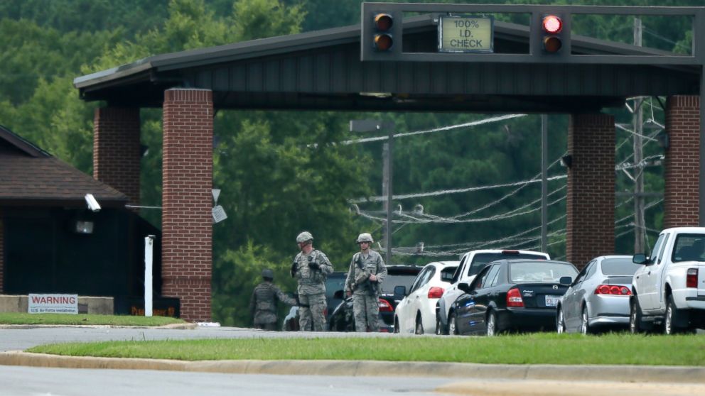 U.S. air Force security patrol near stopped traffic entering the front gate at Little Rock Air Force Base in Jacksonville, Ark., in this July 23, 2014 file photo.