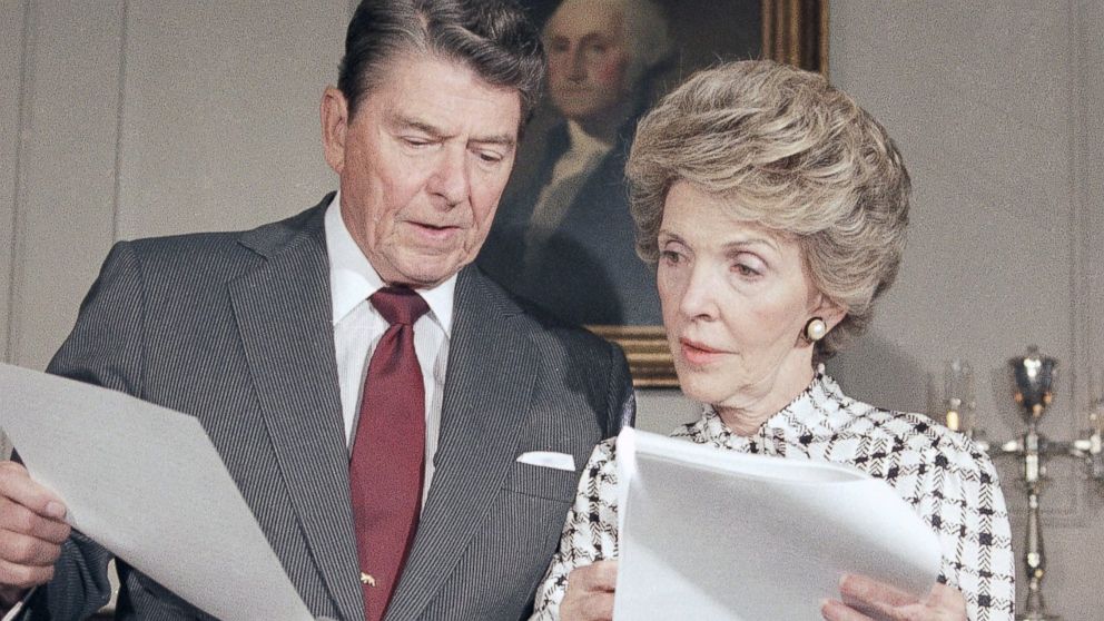 PHOTO:Ronald Reagan and Mrs. Nancy Reagan go over their joint address which they will give to the nation, at the White House in Washington, Sept. 13, 1986. The address will focus on the war against drug abuse.  