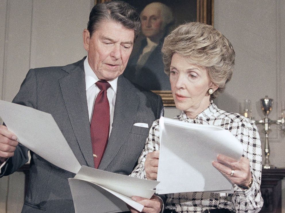 PHOTO:Ronald Reagan and Mrs. Nancy Reagan go over their joint address which they will give to the nation, at the White House in Washington, Sept. 13, 1986. The address will focus on the war against drug abuse.