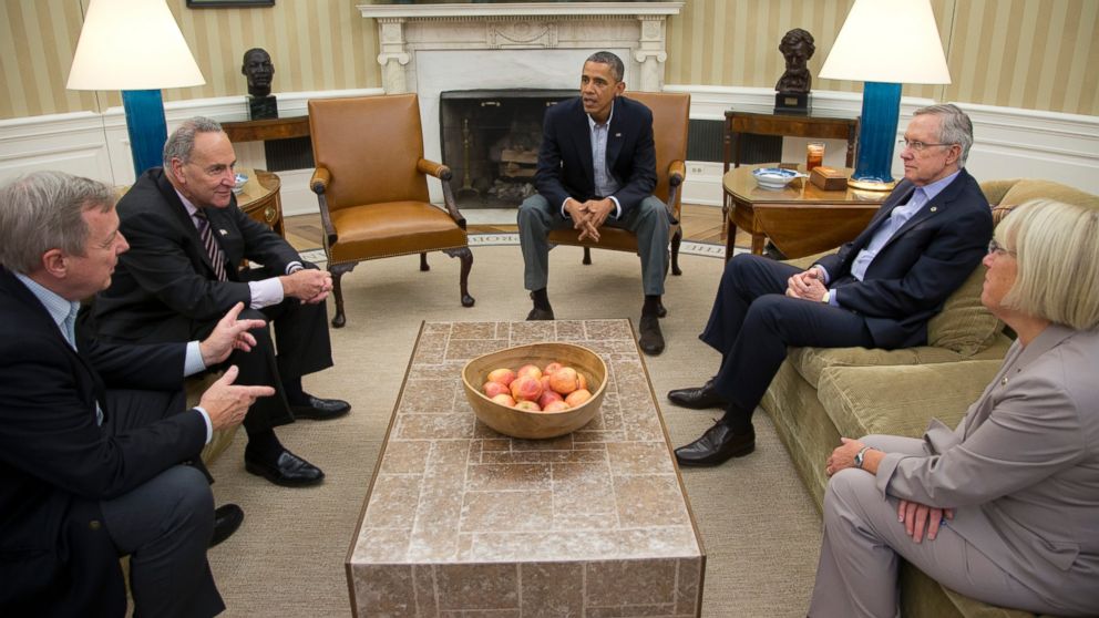 PHOTO: Sen. Dick Durbin, D-Ill., Sen. Charles Schumer, D-N.Y., President Barack Obama, Senate Majority Leader Harry Reid of Nev., Sen. Patty Murray, D-Wash., meet in the Oval Office of the White House, Oct. 12, 2013, in Washington. 