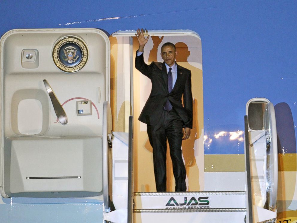PHOTO: President Barack Obama waves during his arrival on Air Force One, April 8, 2015, at Norman Manley International Airport in Kingston, Jamaica.
